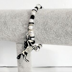 Handmade Black and White Beaded Unicorn Skeleton Charm Bracelet
